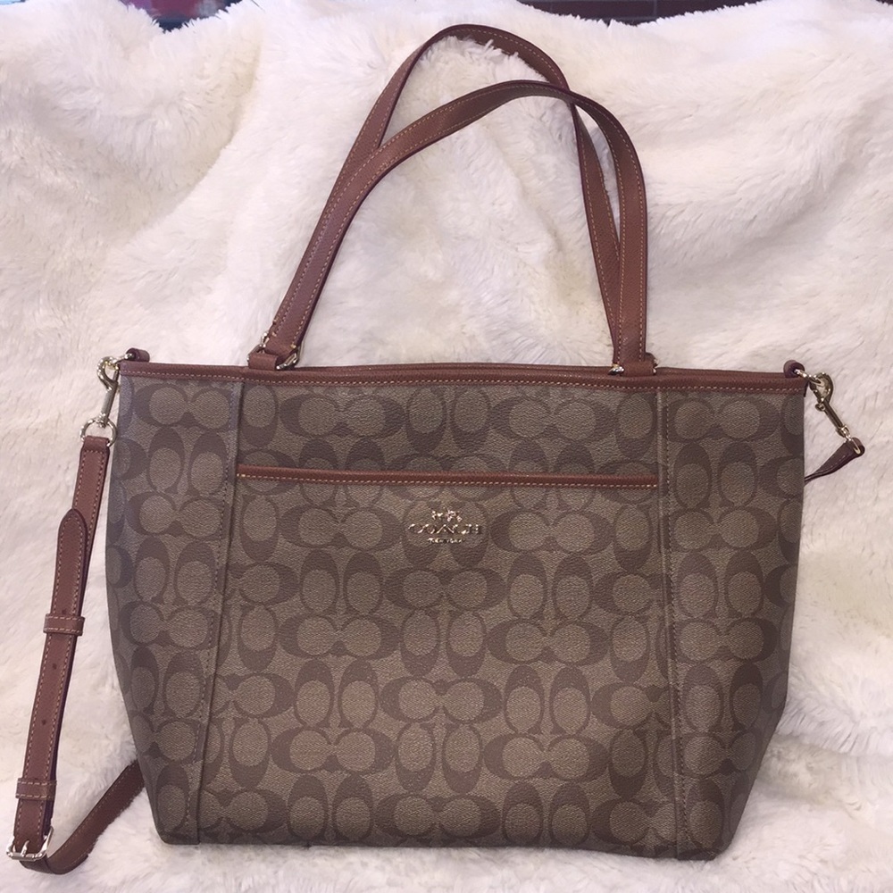 Brand new Coach leather purse.
